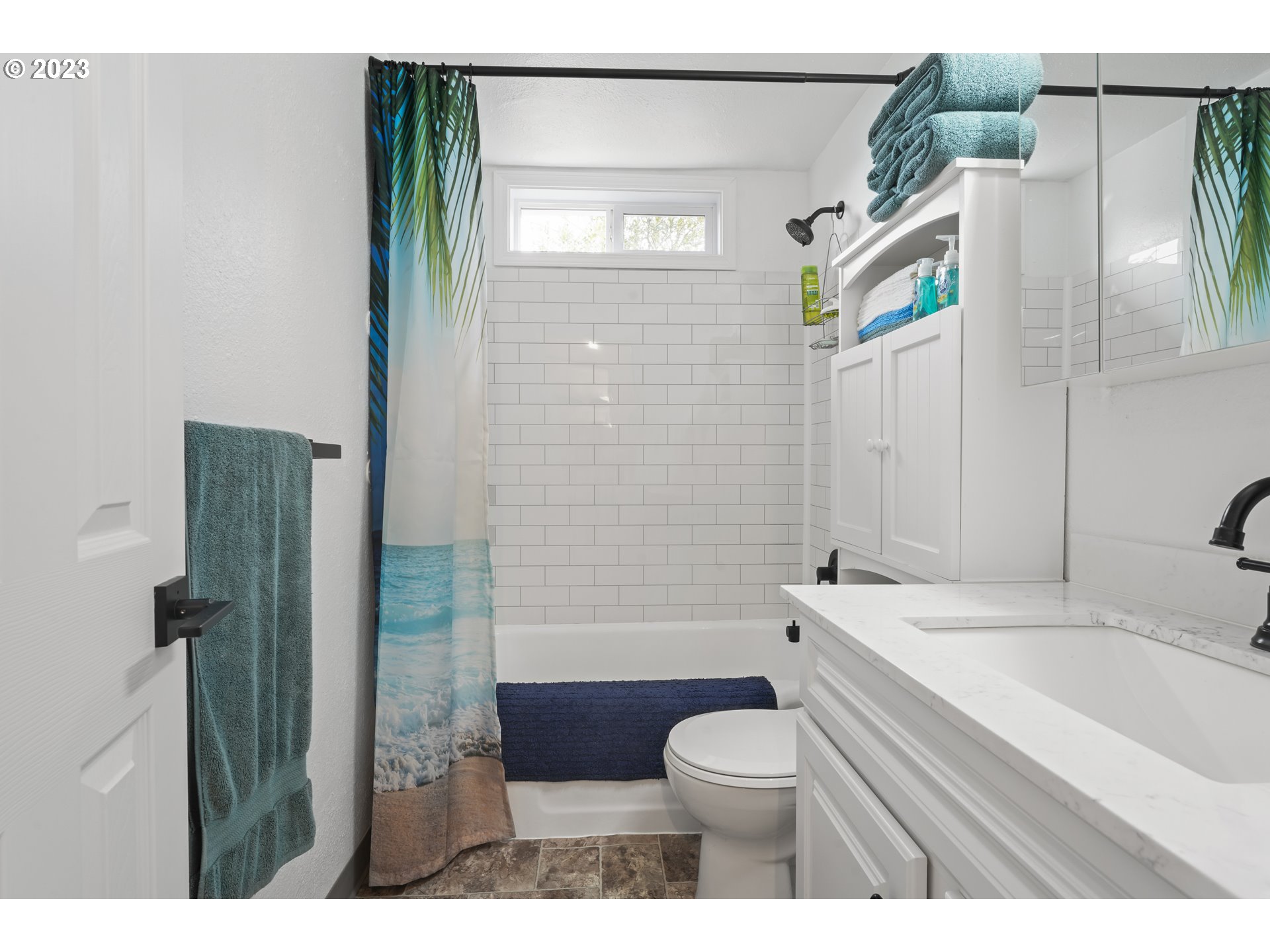 1138 18th Street Springfield, OR 97477 - Photo 19 of 32 a bathroom with a sink toilet and shower