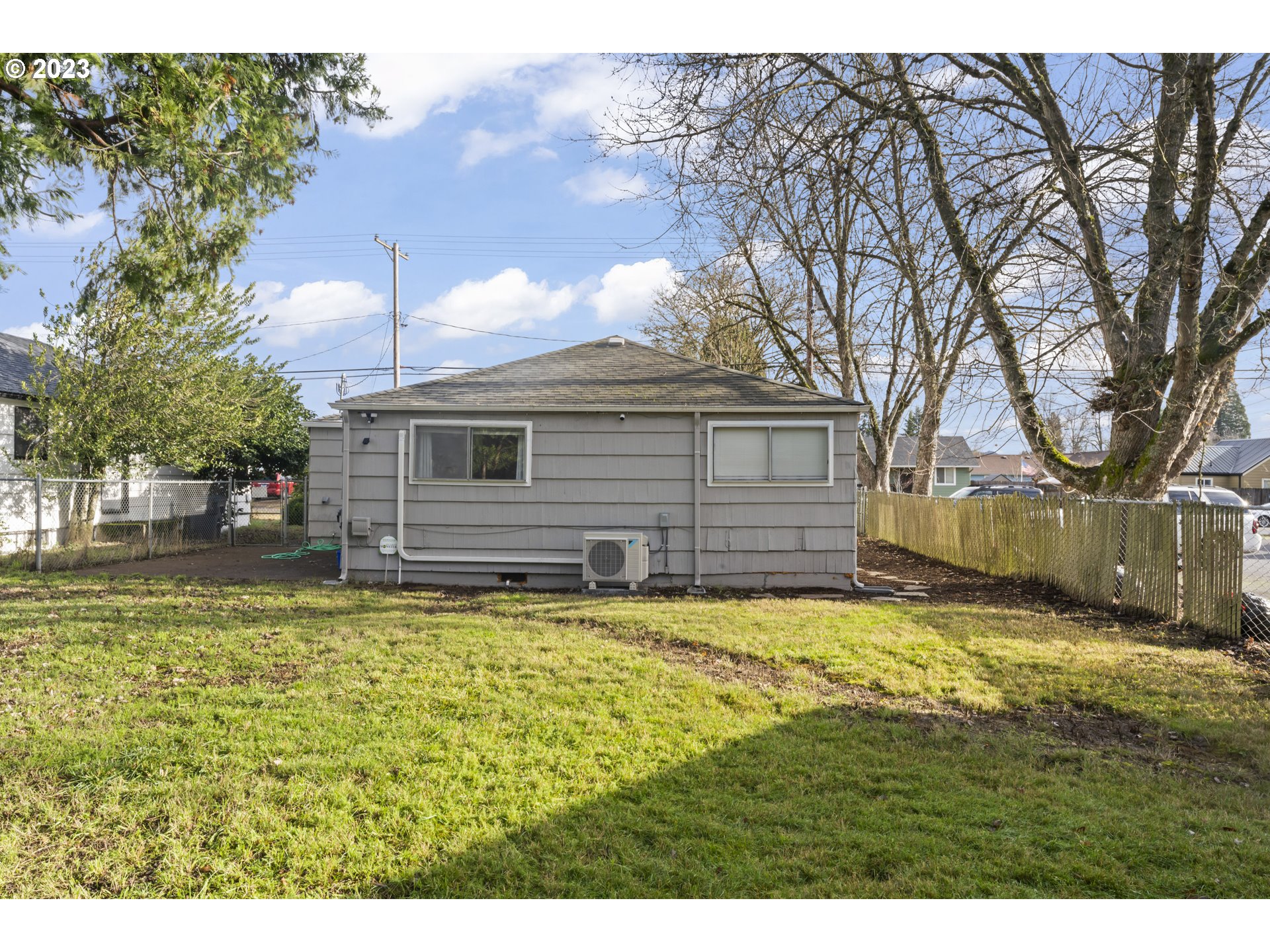 1138 18th Street Springfield, OR 97477 - Photo 24 of 32 a swimming pool with trees in the background
