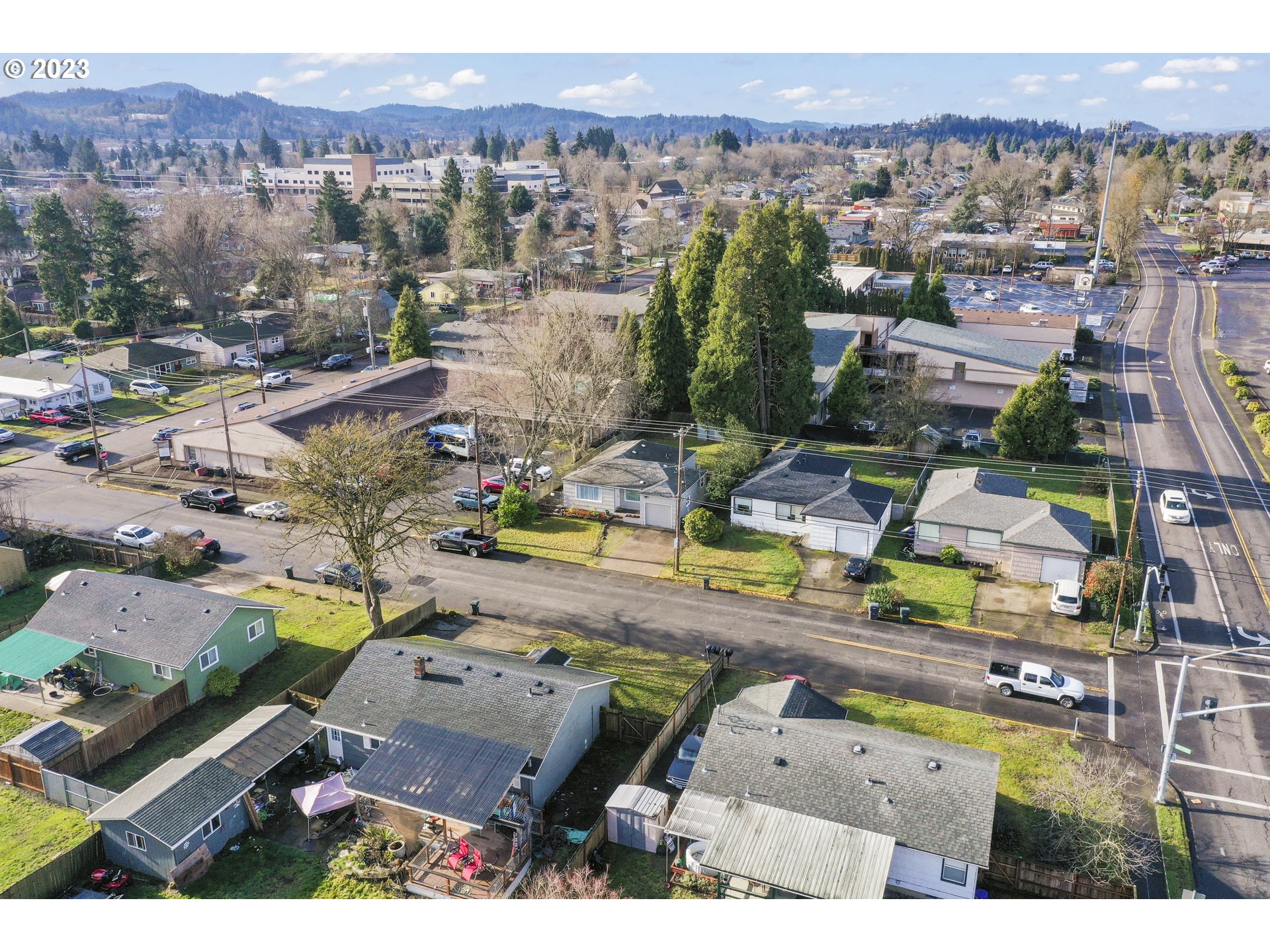 1138 18th Street Springfield, OR 97477 - Photo 27 of 32 an aerial view of residential houses with outdoor space