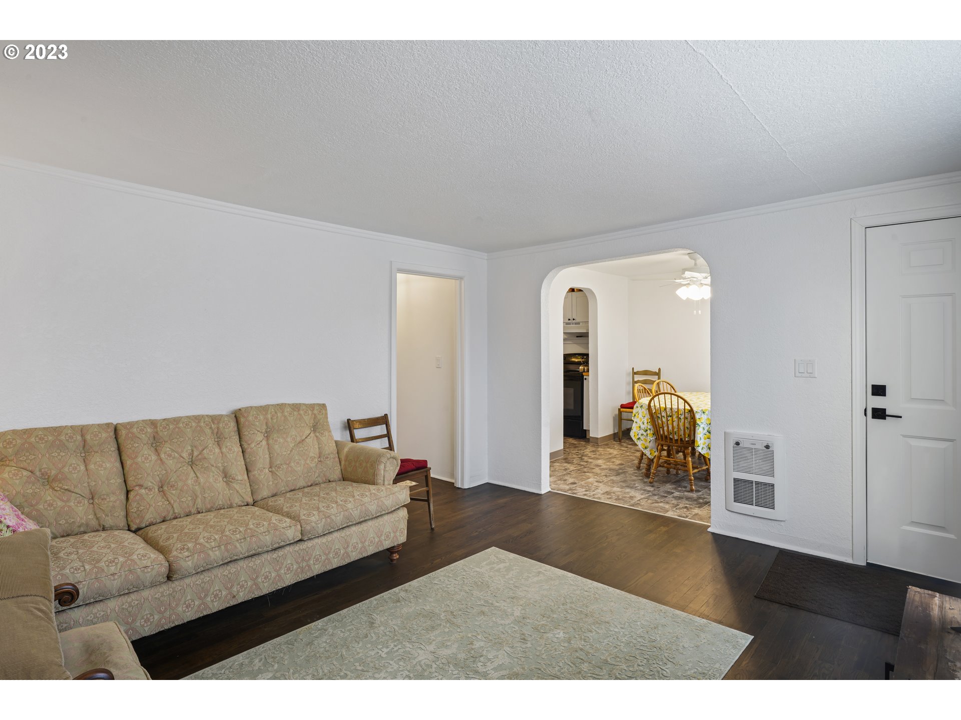 1138 18th Street Springfield, OR 97477 - Photo 6 of 32 a living room with furniture and wooden floor