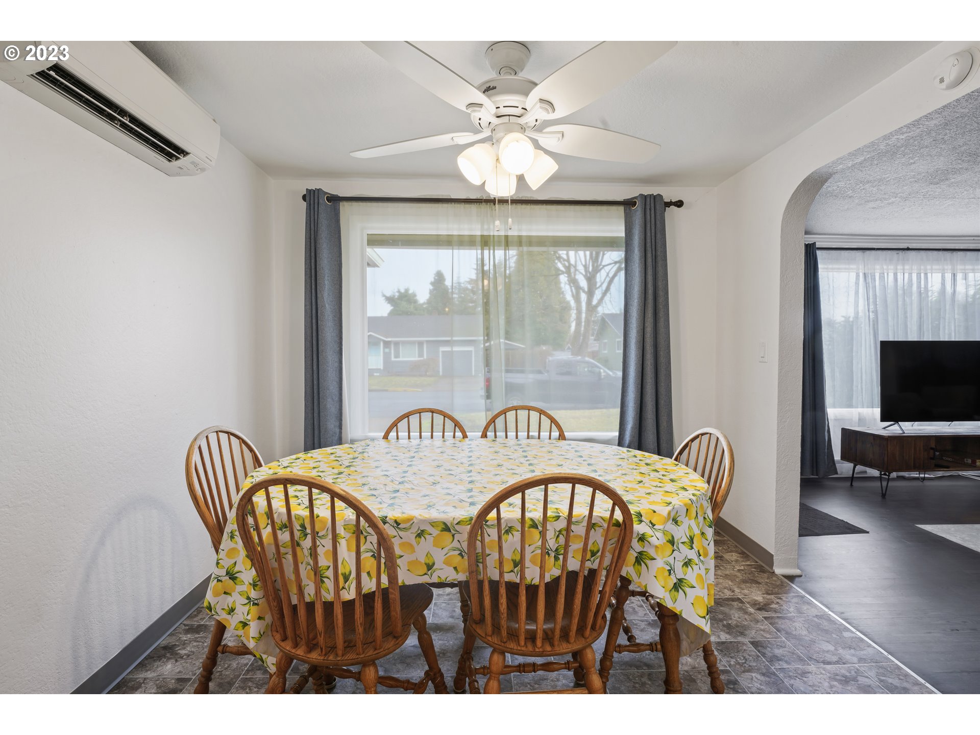 1138 18th Street Springfield, OR 97477 - Photo 7 of 32 a view of a dining room with furniture window and wooden floor