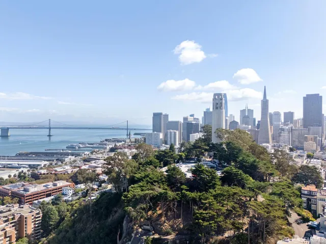 a kitchen with stainless steel appliances granite countertop wooden cabinets and a counter top