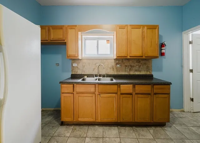 a bathroom with a sink and shower