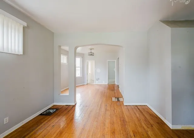 a kitchen with stainless steel appliances granite countertop a stove a refrigerator and a microwave