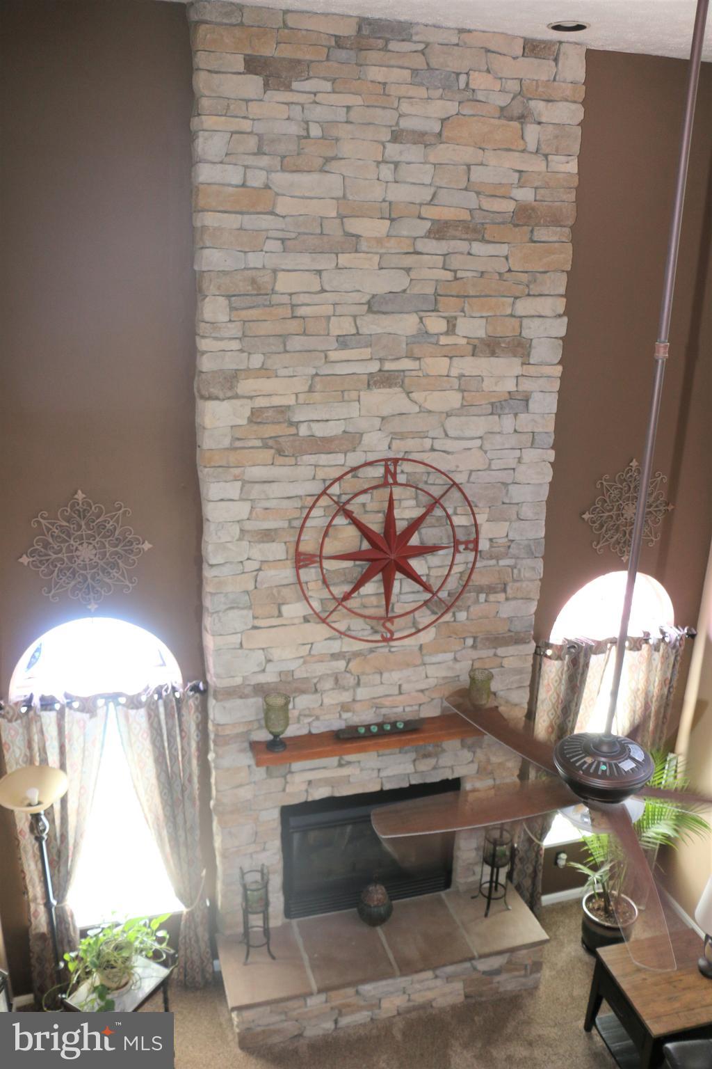 437 Spry Island Road Joppa, MD 21085 - Photo 12 of 57 Beautiful gas fireplace w/full height stone