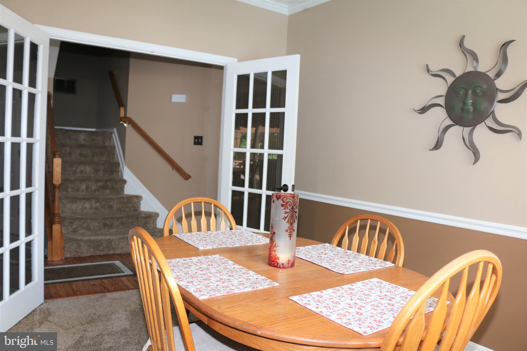 437 Spry Island Road Joppa, MD 21085 - Photo 16 of 57 Double French doors at dining room