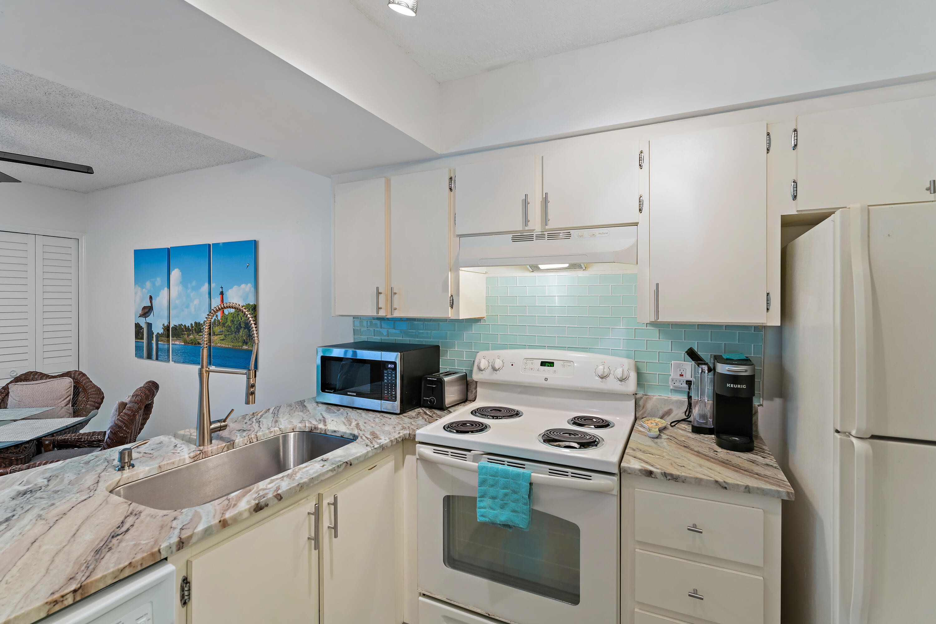 1605 Highway 1, Unit E104 Jupiter, FL 33477 - Photo 21 of 34 014-1605US1N-E104-Jupiter-FULL
