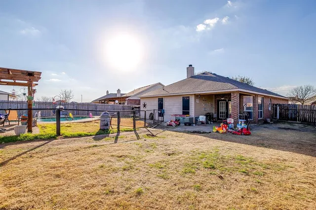 a view of swimming pool with sitting area and seating area