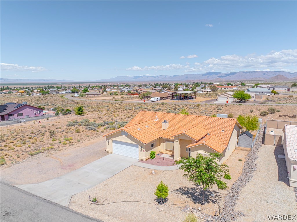 9332 Branded Road Kingman, AZ 86401 - Photo 42 of 44 an aerial view of residential houses with outdoor space and ocean