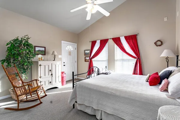 a view of a livingroom with furniture and closet