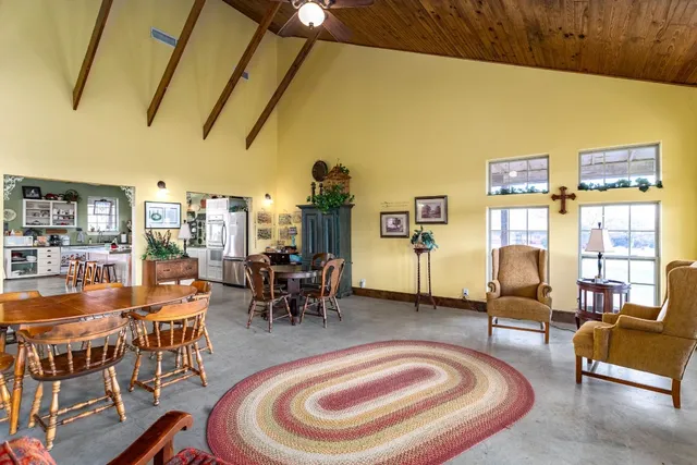 a bathroom with a sink a mirror and a shower