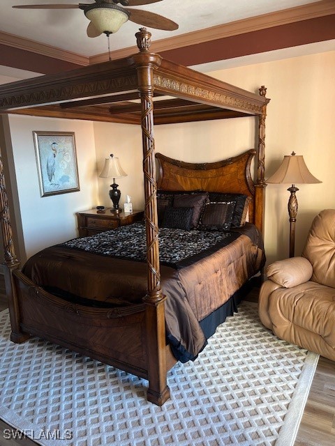 2743 First Street, Unit 804 Fort Myers, FL 33916 - Photo 4 of 11 a bedroom with a bed and wooden floor