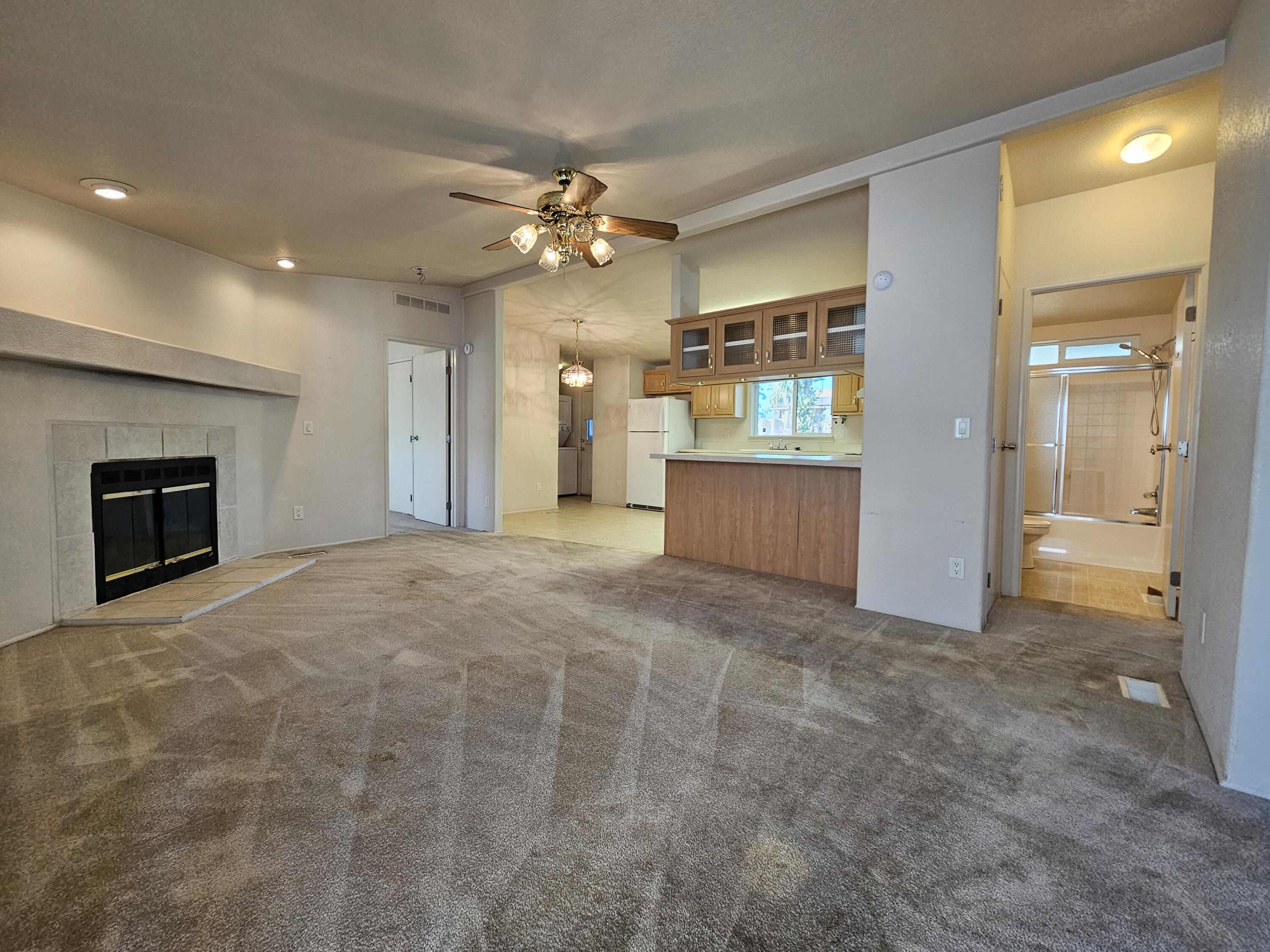 51 Alesandro Road Palm Springs, CA 92264 - Photo 2 of 21 a view of a kitchen with a sink and a cabinet a fireplace