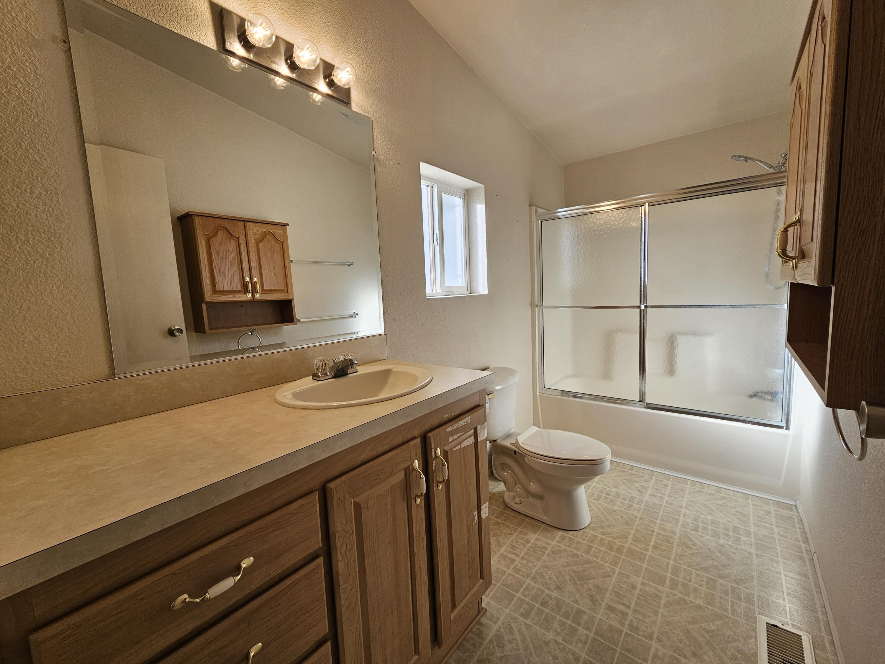 51 Alesandro Road Palm Springs, CA 92264 - Photo 8 of 21 a bathroom with a sink a toilet and shower