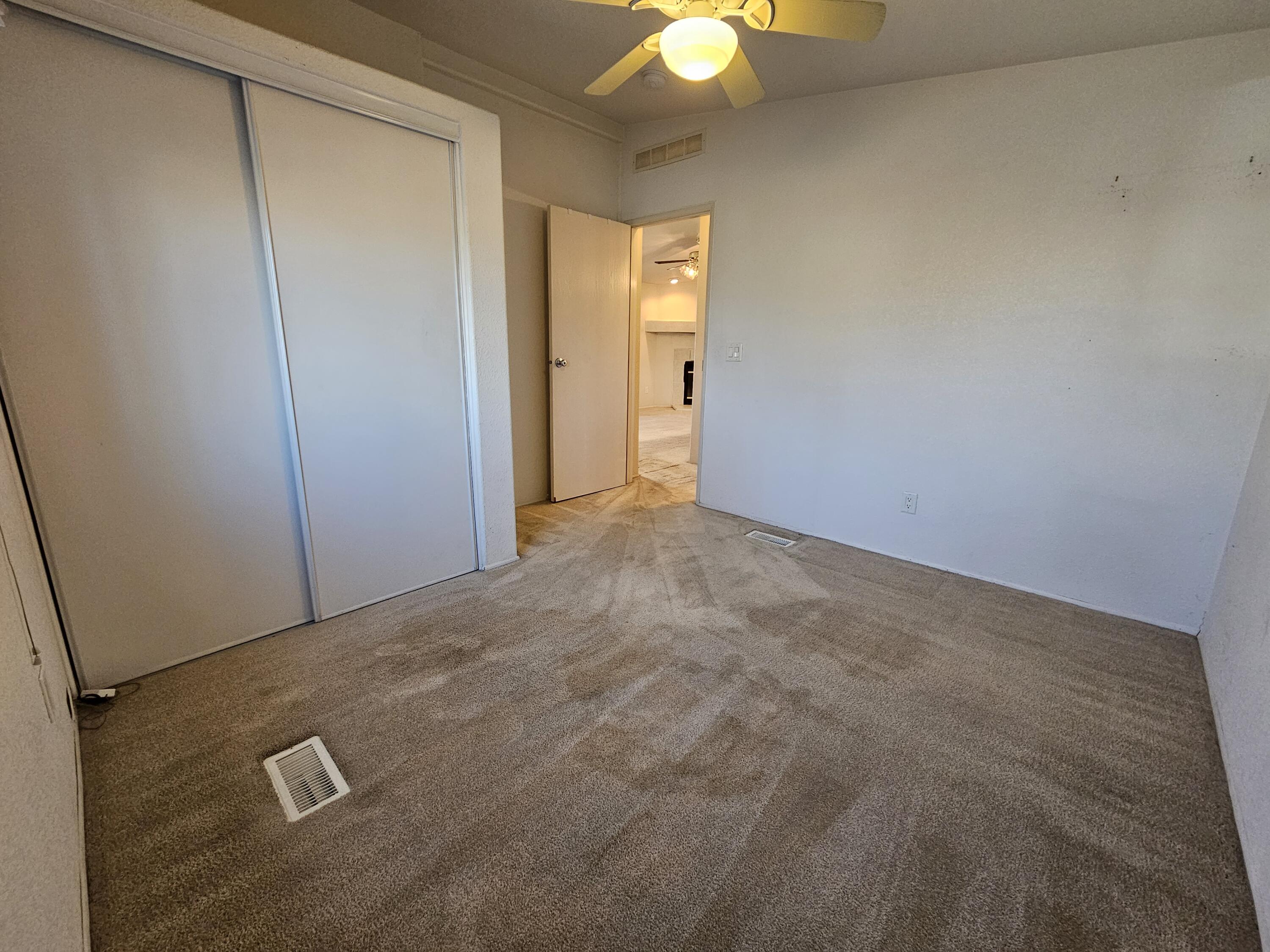 51 Alesandro Road Palm Springs, CA 92264 - Photo 9 of 21 an empty room with a door