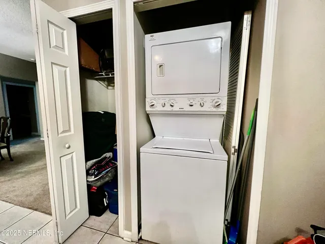 a view of a backyard with swimming pool