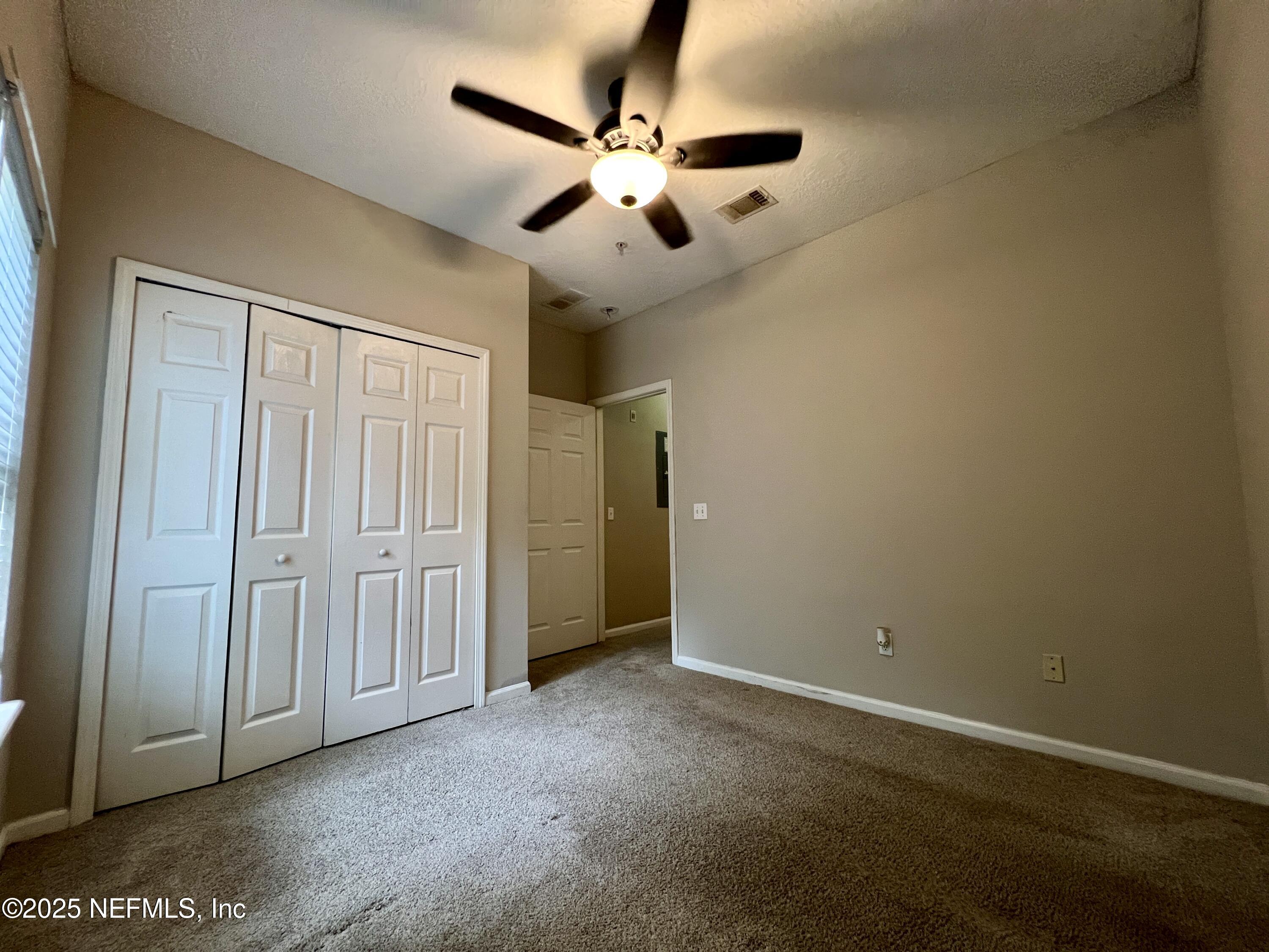 3610 Kirkpatrick Circle, Unit 8 Jacksonville, FL 32210 - Photo 3 of 18 wooden floor in an empty room