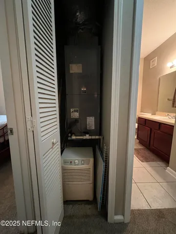 a view of storage and utility room