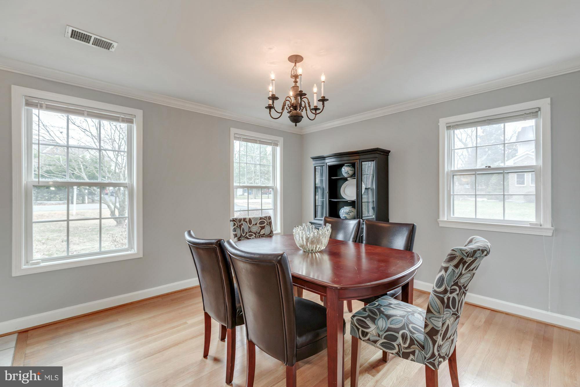 7004 Ridgeway Drive Springfield, VA 22150 - Photo 11 of 28 a view of a dining room with furniture window and wooden floor