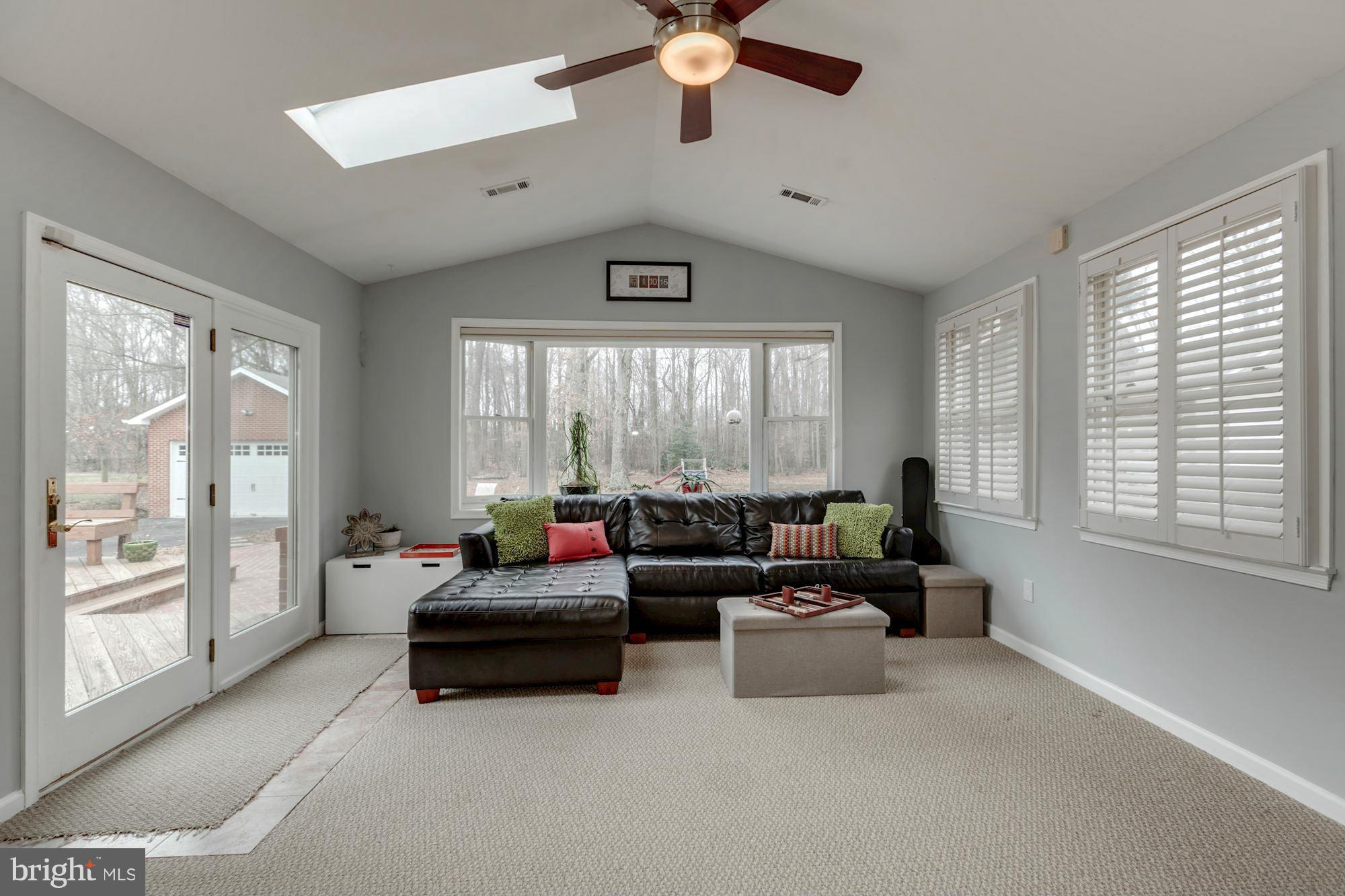 7004 Ridgeway Drive Springfield, VA 22150 - Photo 17 of 28 a living room with furniture and a large window