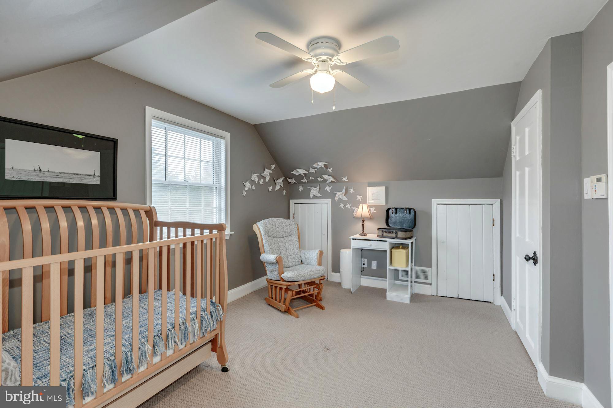 7004 Ridgeway Drive Springfield, VA 22150 - Photo 24 of 28 a view of a bedroom with furniture and windows