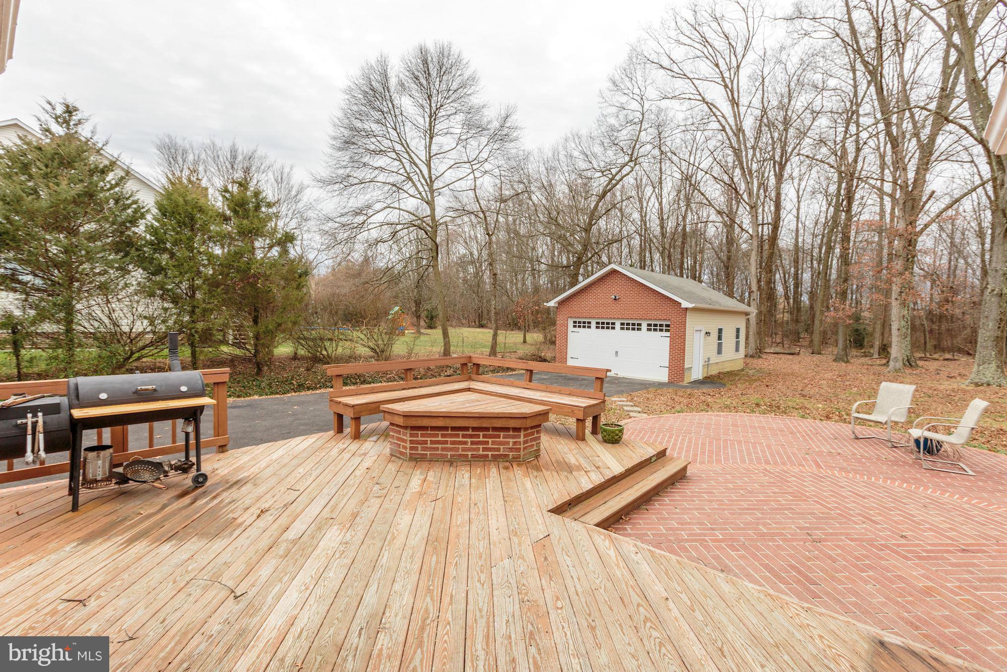 7004 Ridgeway Drive Springfield, VA 22150 - Photo 26 of 28 a view of a roof deck with wooden floor and barbeque oven