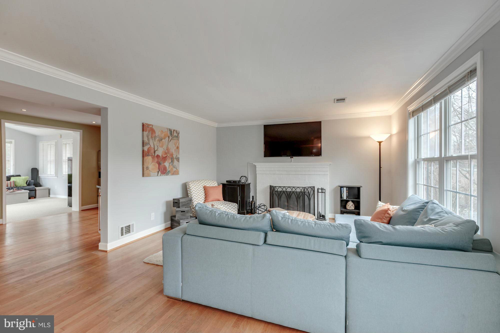 7004 Ridgeway Drive Springfield, VA 22150 - Photo 7 of 28 a living room with furniture and a flat screen tv