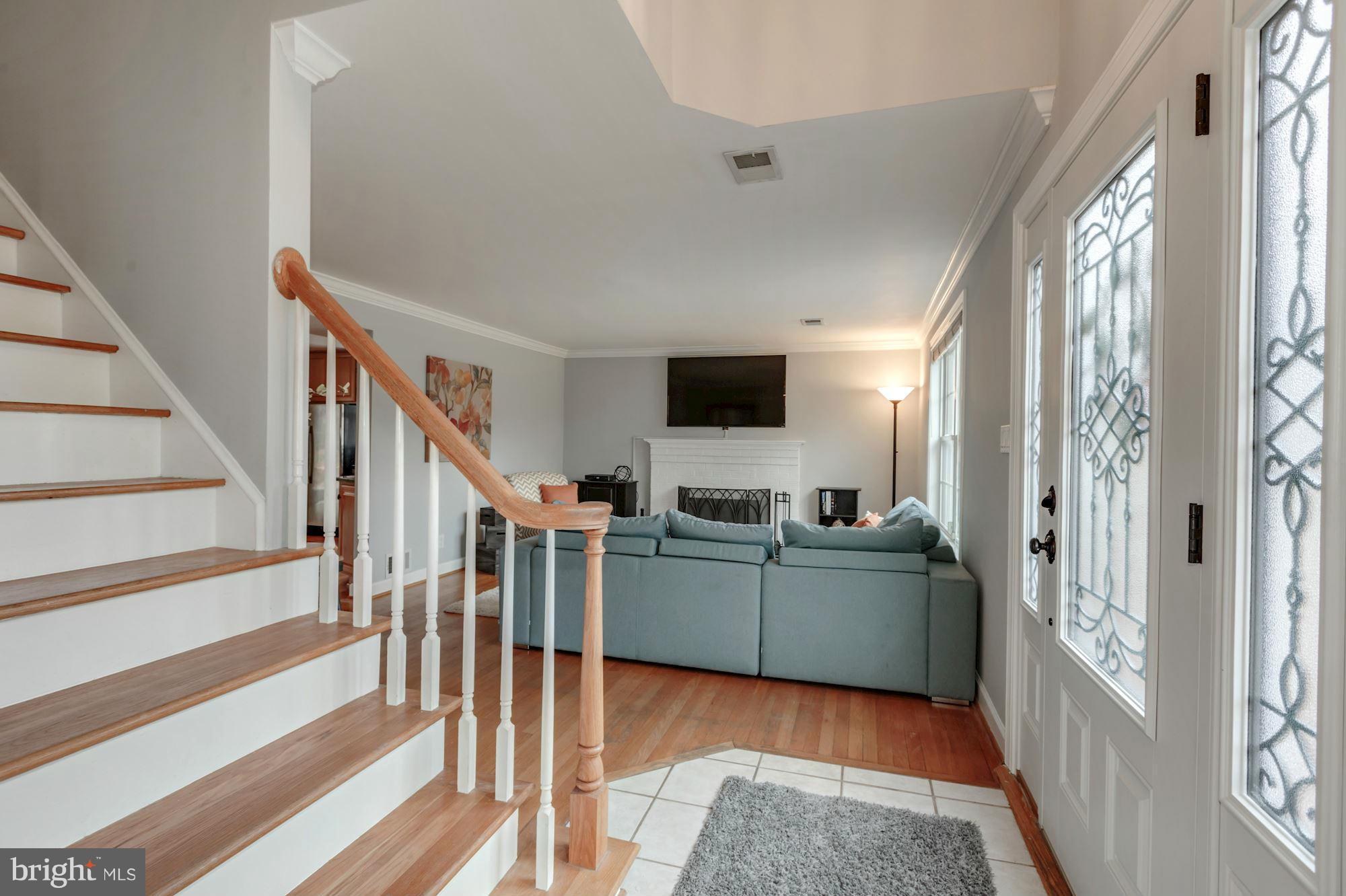 7004 Ridgeway Drive Springfield, VA 22150 - Photo 8 of 28 a view of a livingroom with wooden floor and furniture