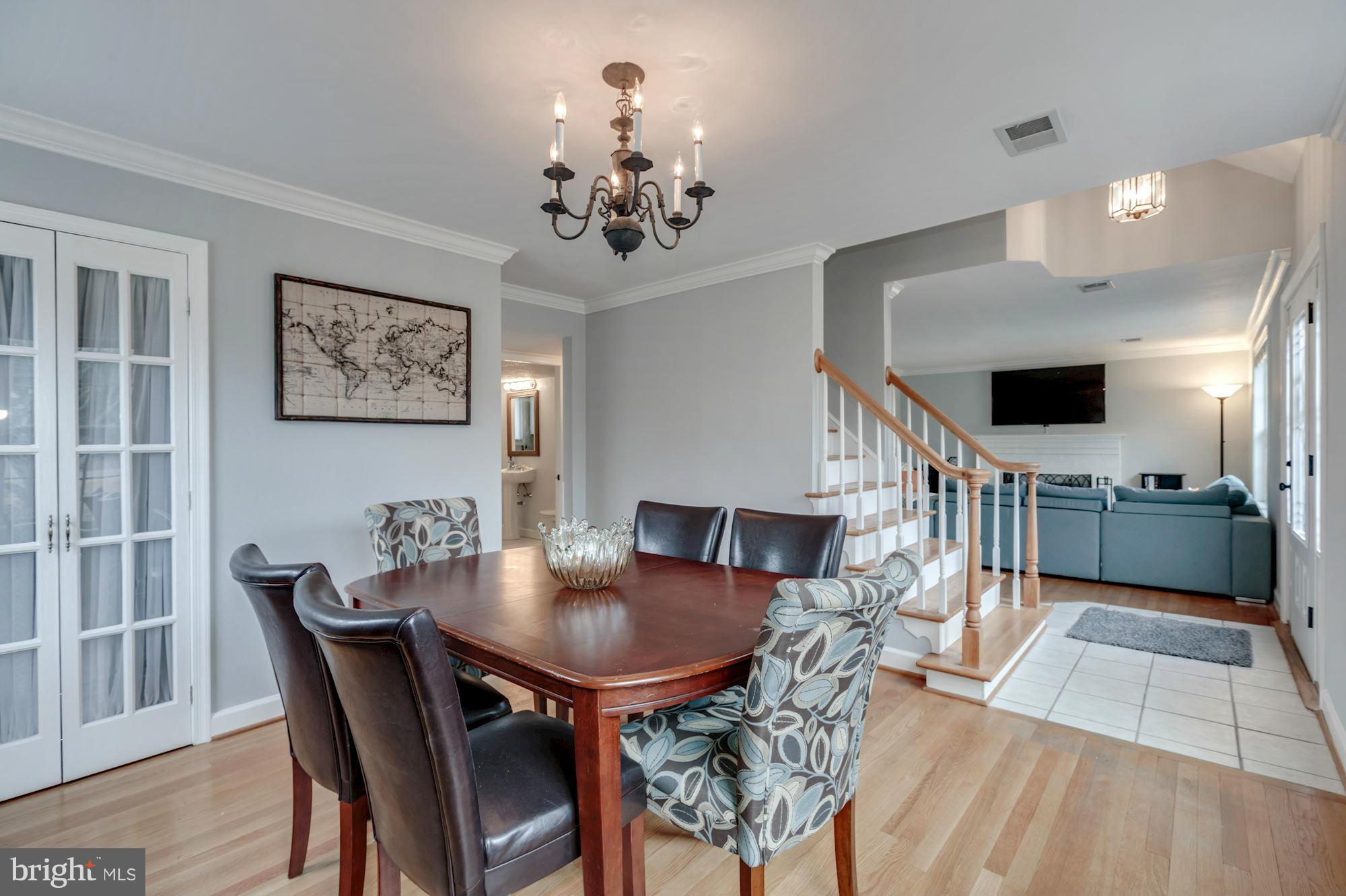 7004 Ridgeway Drive Springfield, VA 22150 - Photo 9 of 28 a view of a dining room with furniture and wooden floor
