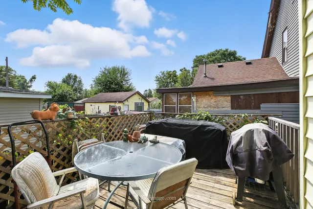 a front view of house with outdoor seating
