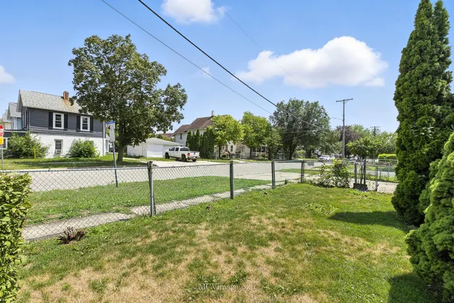 a house with trees in the background