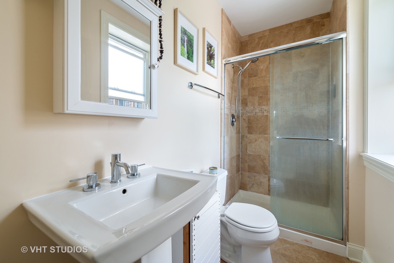 2140 West Addison Street, Unit 3D Chicago, IL 60618 - Photo 8 of 11 a bathroom with a sink toilet and shower