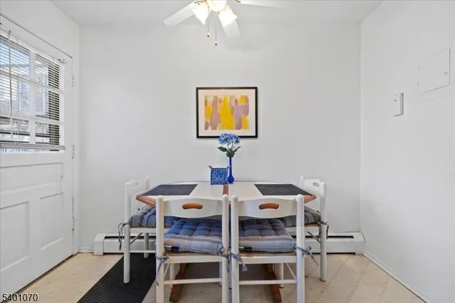 a view of a workspace with furniture