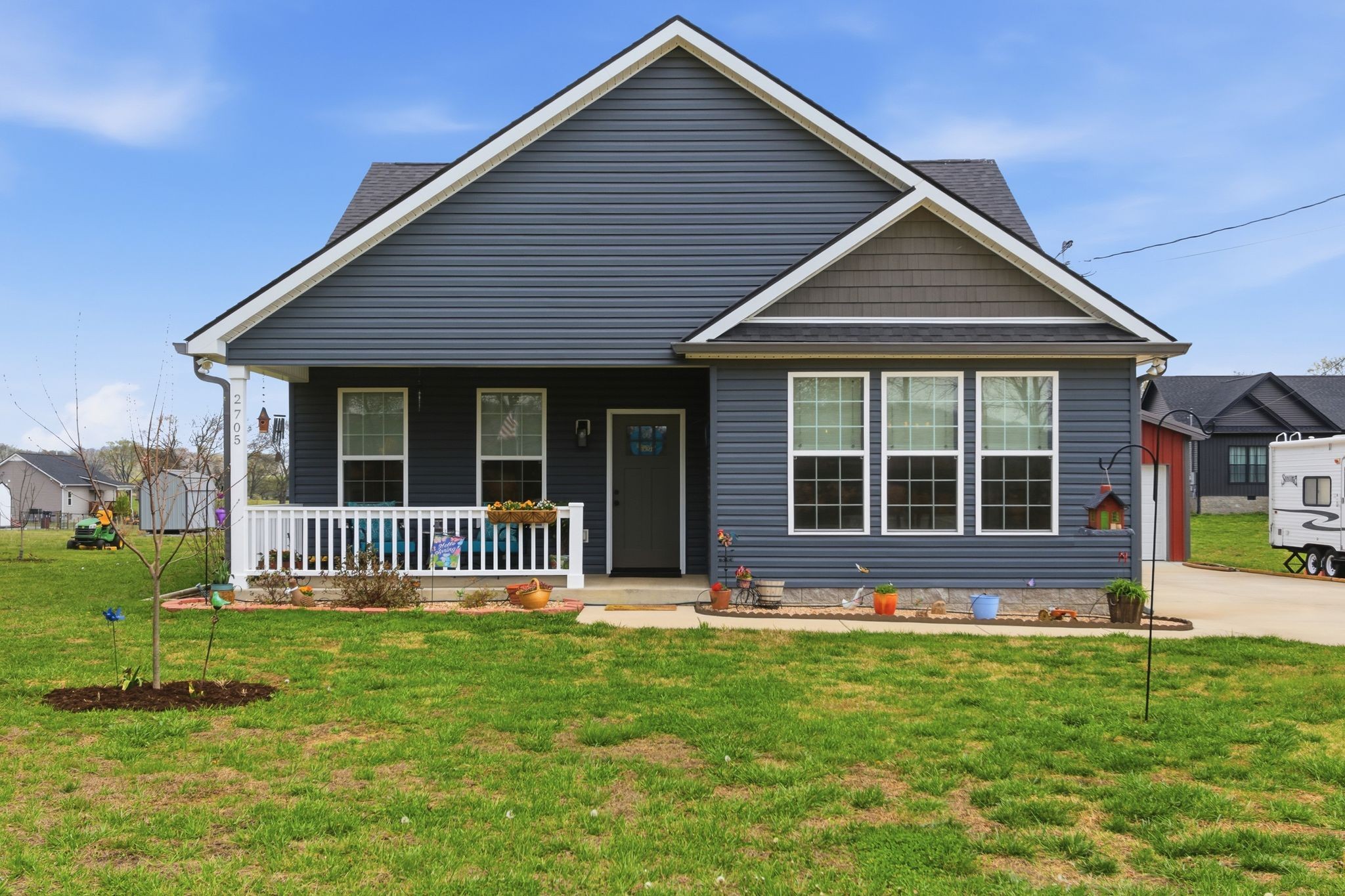 2705 Mc Connell Road Cornersville, TN 37047 - Photo 3 of 41 a front view of a house with a yard