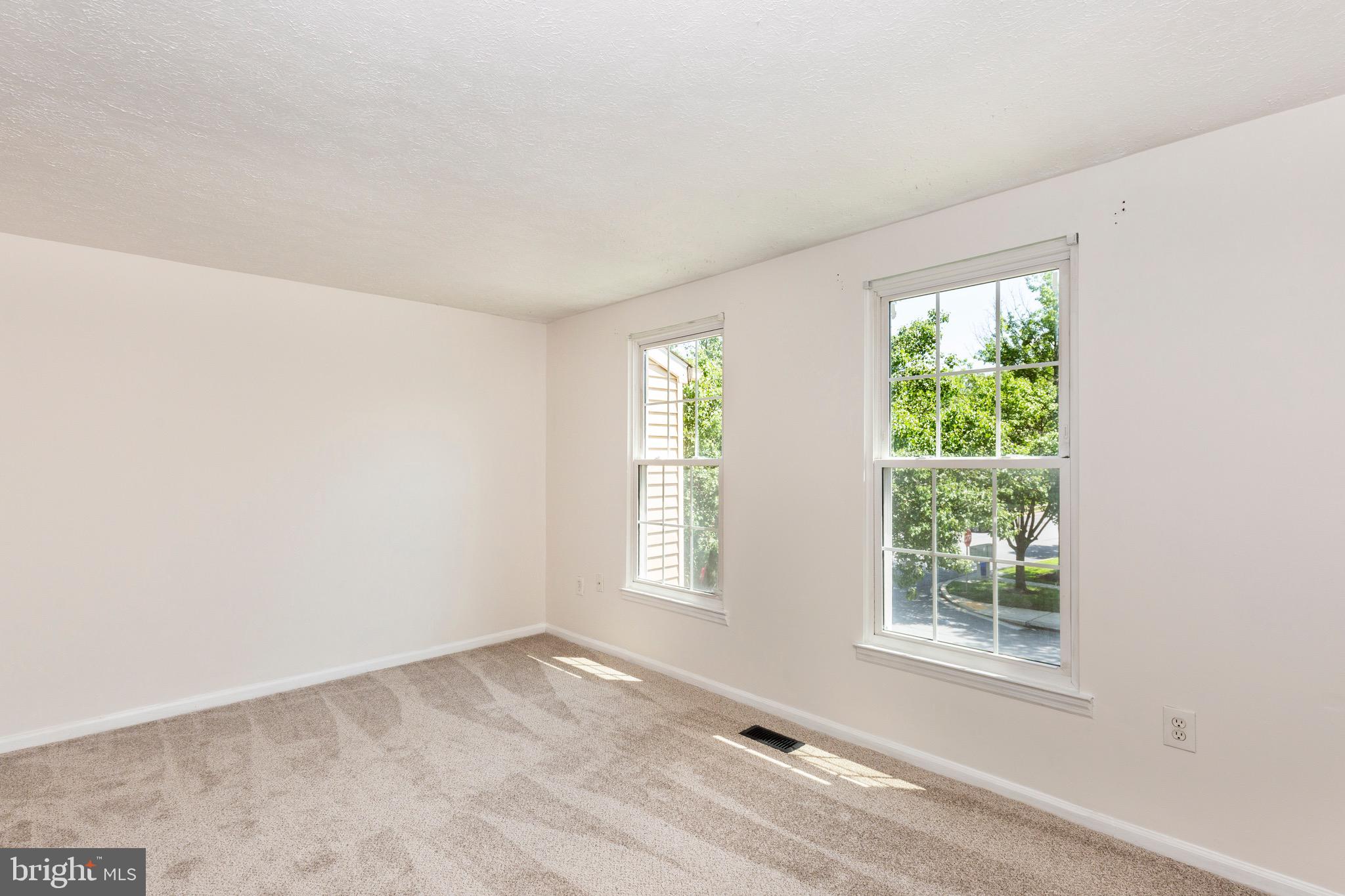 4903 Clifford Road Perry Hall, MD 21128 - Photo 12 of 30 an empty room with windows