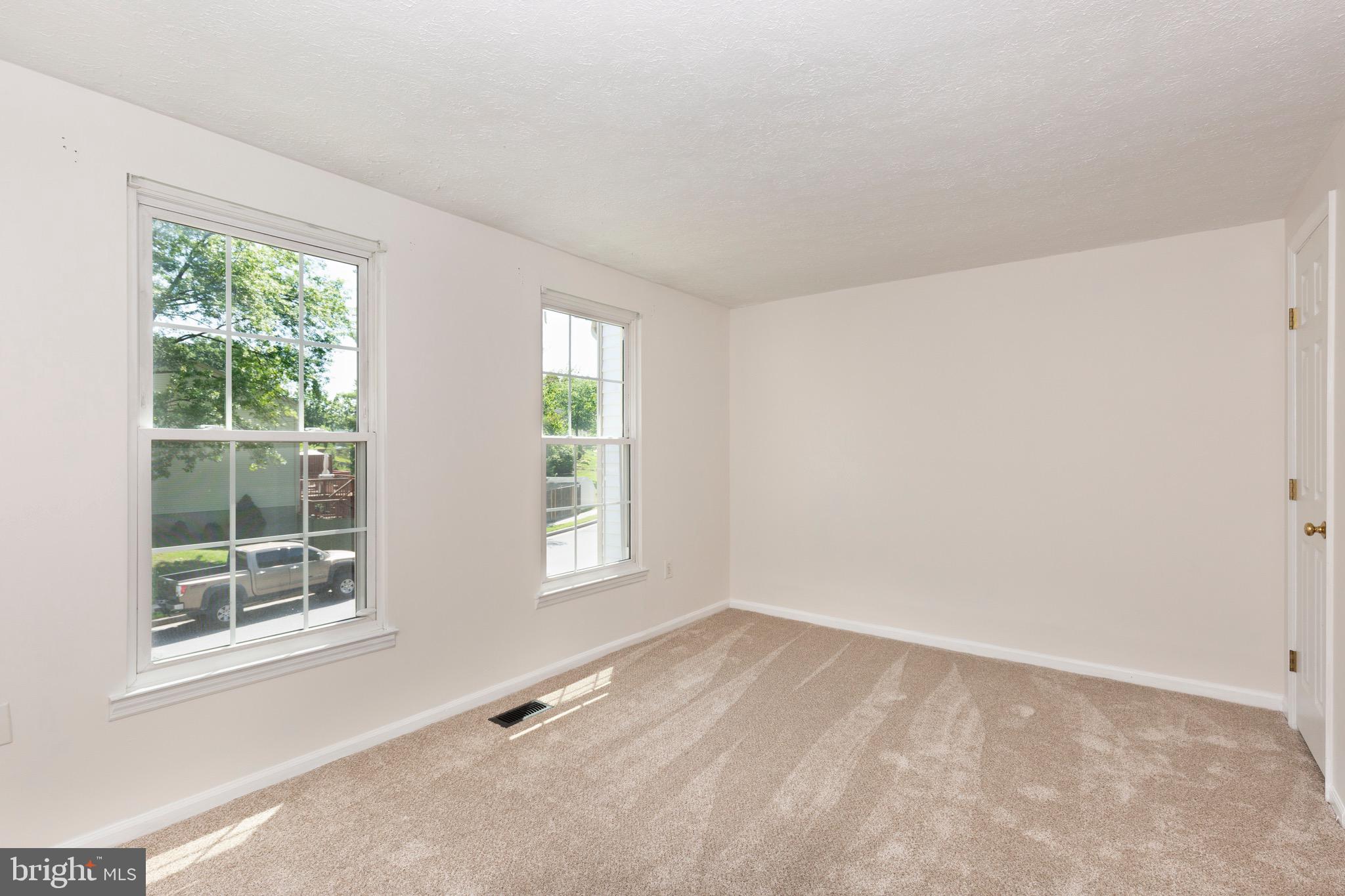 4903 Clifford Road Perry Hall, MD 21128 - Photo 14 of 30 an empty room with windows