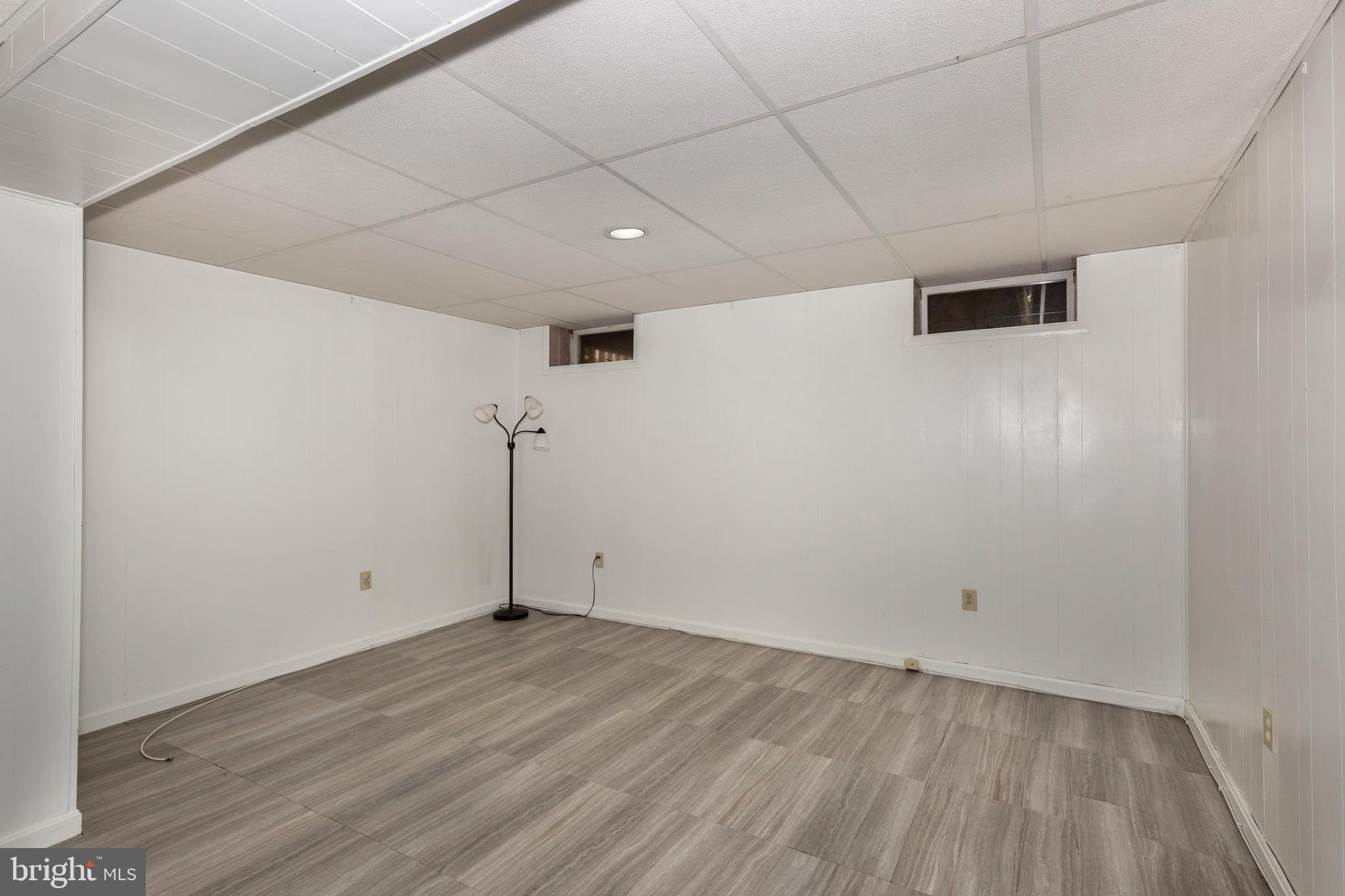 4903 Clifford Road Perry Hall, MD 21128 - Photo 22 of 30 a view of empty room with wooden floor