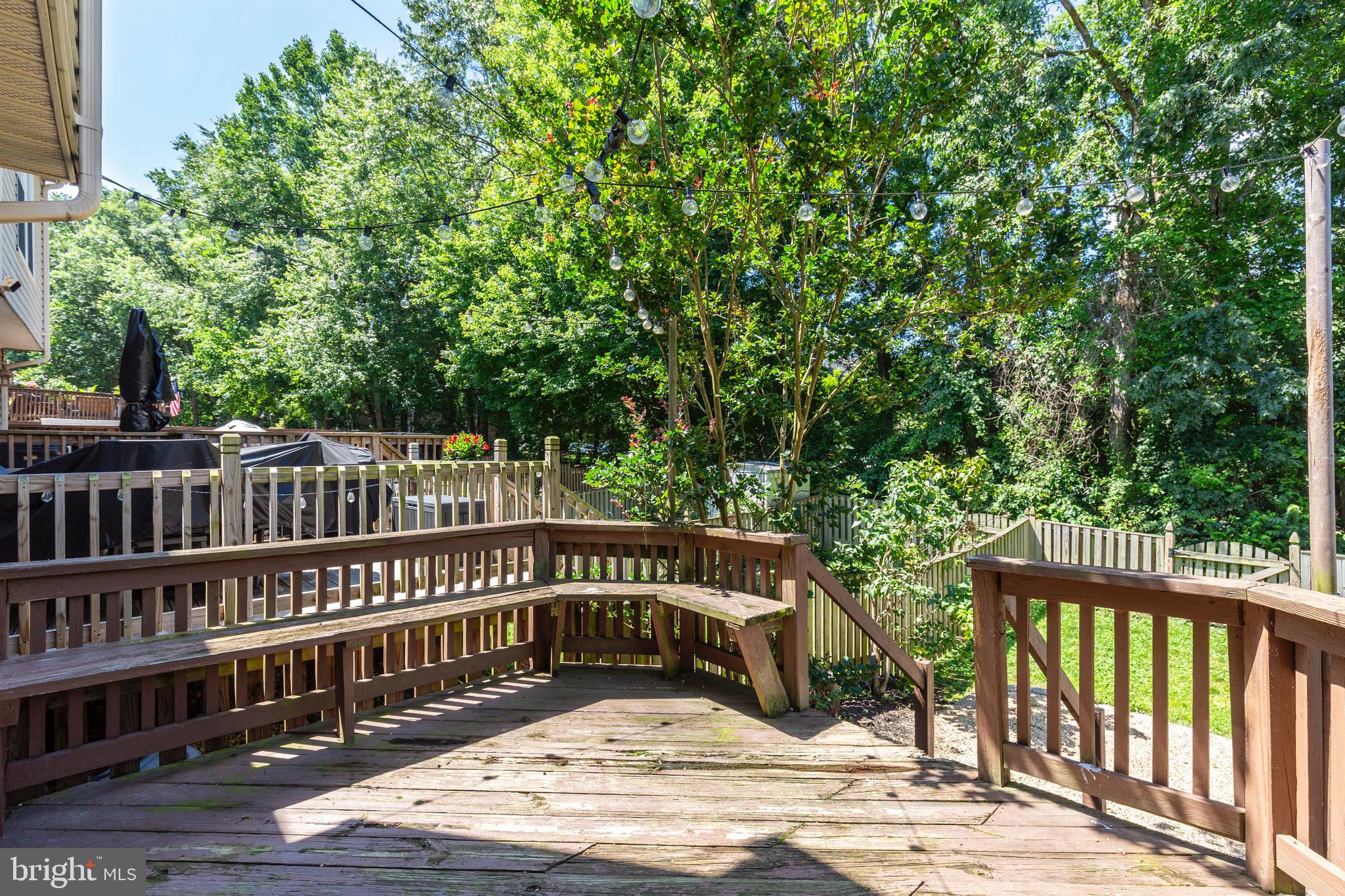 4903 Clifford Road Perry Hall, MD 21128 - Photo 26 of 30 a view of a house with backyard and deck