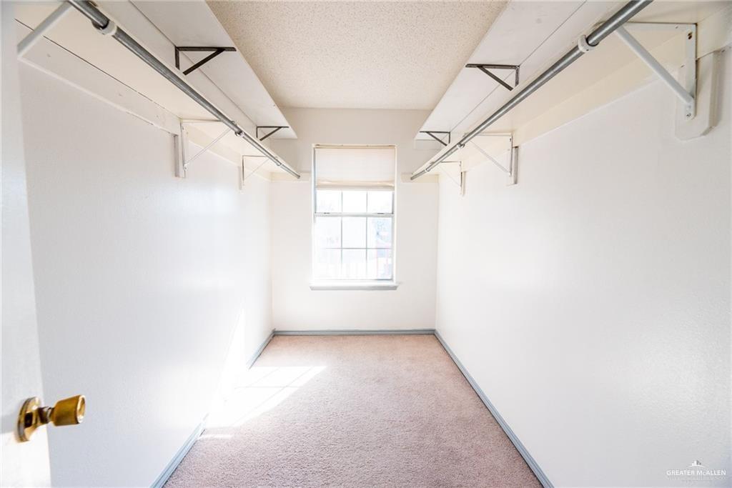 2008 West 40th Street Mission, TX 78573 - Photo 14 of 14 a view of a hallway with a white walls and a window