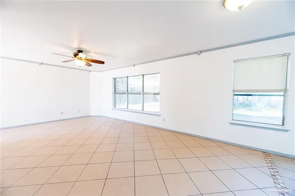 a view of an empty room and window