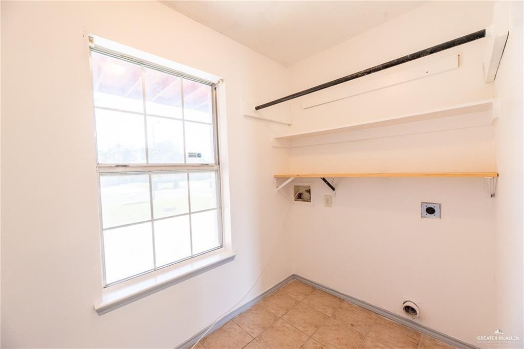 2008 West 40th Street Mission, TX 78573 - Photo 7 of 14 a view of a small space with wooden floor and a window