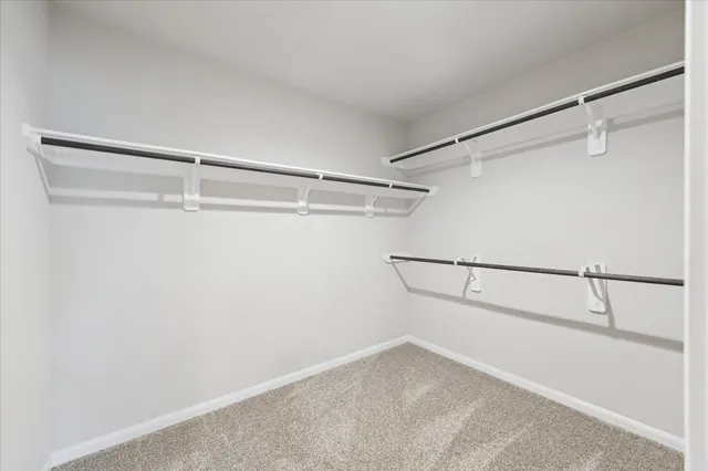a view of an empty walk in closet
