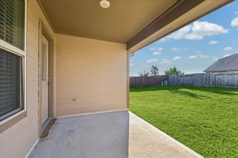 a view of a backyard with a garden
