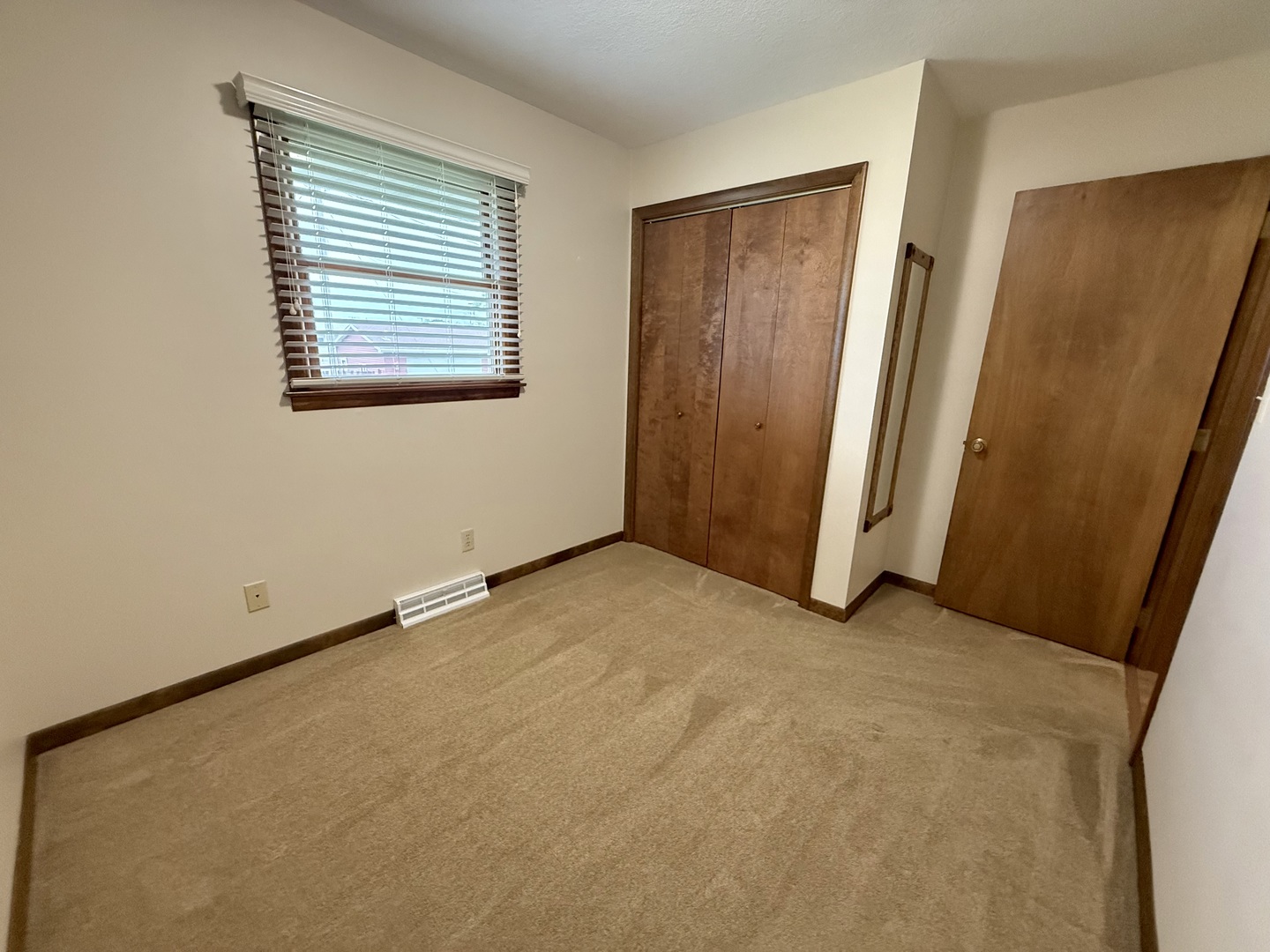 203 West Summit Street Gifford, IL 61847 - Photo 17 of 22 an empty room with windows