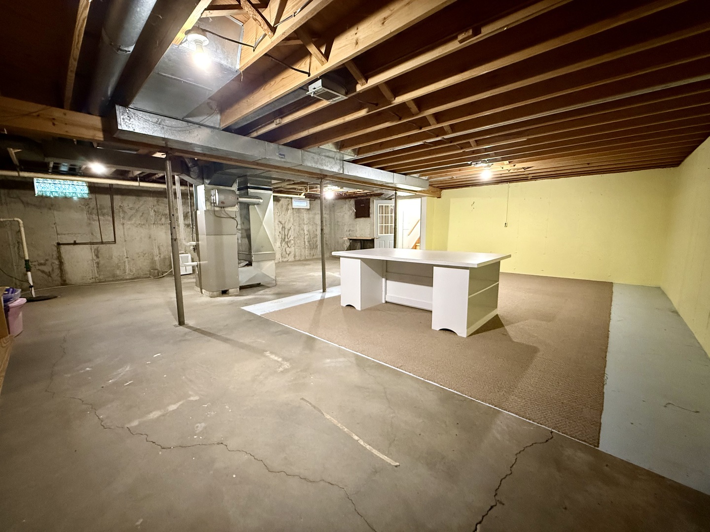 203 West Summit Street Gifford, IL 61847 - Photo 18 of 22 a view of an empty room with wooden roof