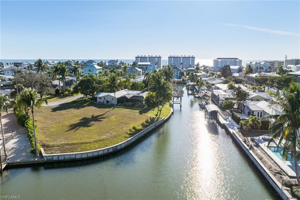 271 Randy Lane Fort Myers Beach, FL 33931 - Photo 15 of 38 a view of a swimming pool with a lake