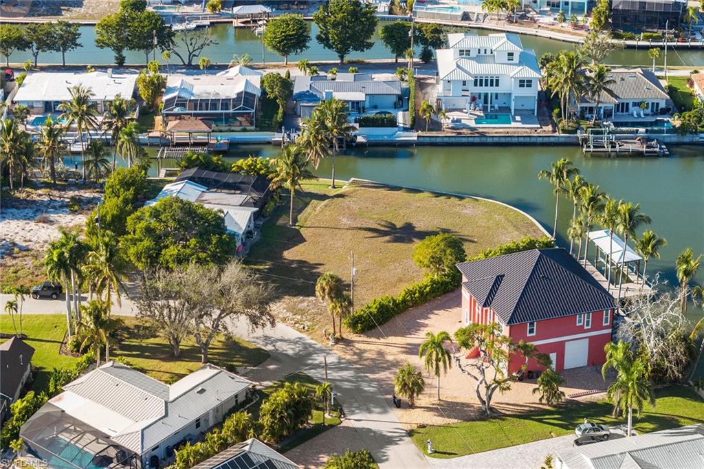 271 Randy Lane Fort Myers Beach, FL 33931 - Photo 21 of 38 an aerial view of a house with a lake view