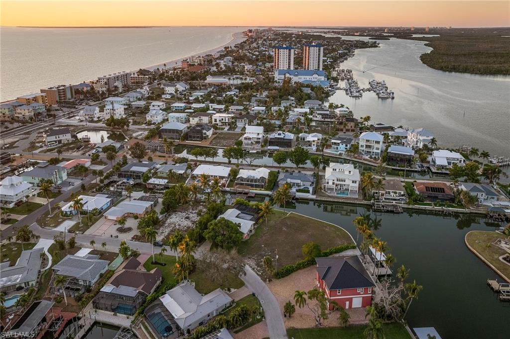 271 Randy Lane Fort Myers Beach, FL 33931 - Photo 30 of 38 an aerial view of a house with a lake view