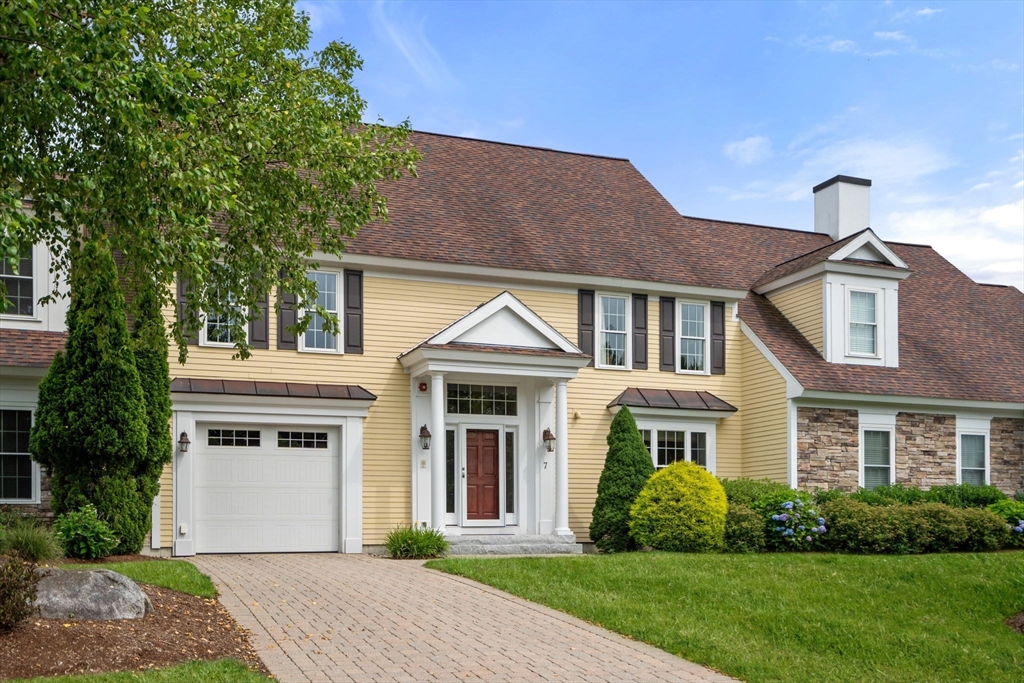 7 English Cmns, Unit 7 Topsfield, MA 01983 - Photo 28 of 36 a front view of a house with a yard