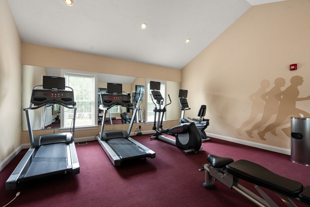 7 English Cmns, Unit 7 Topsfield, MA 01983 - Photo 34 of 36 a room with gym equipment and a table